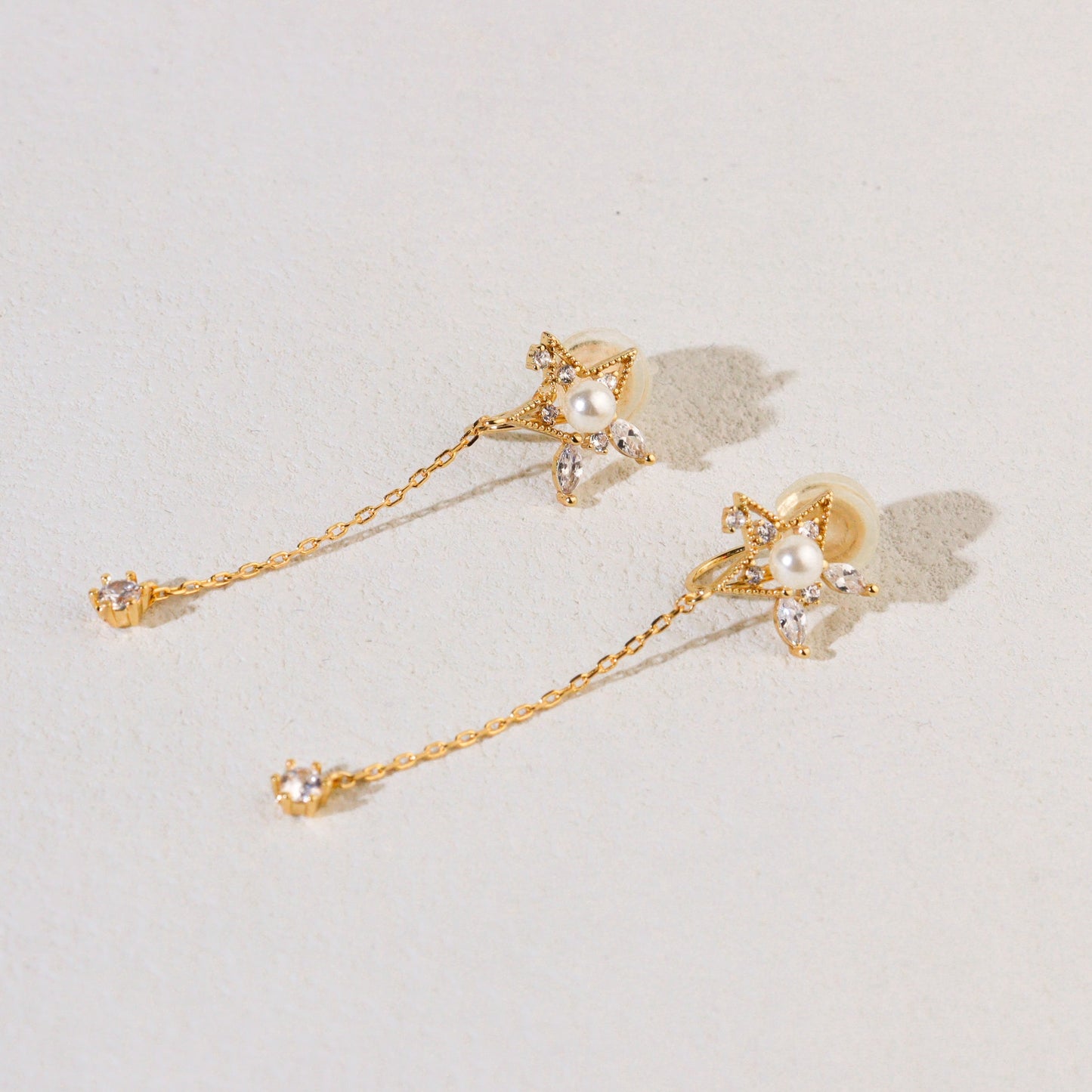 Fetching Meteor Gold Clip On Earrings